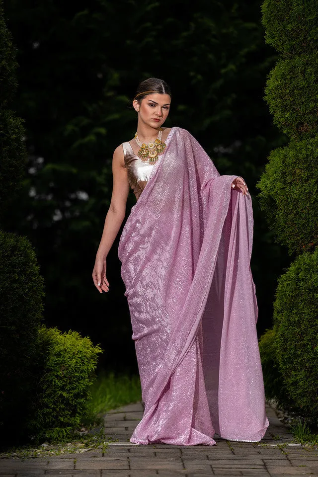 Beautiful Purple colored Saree with designer blouse - Rent